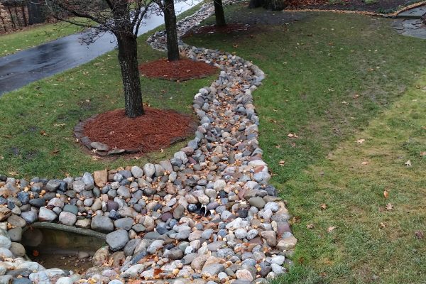 Ways to implement a swale drainage system