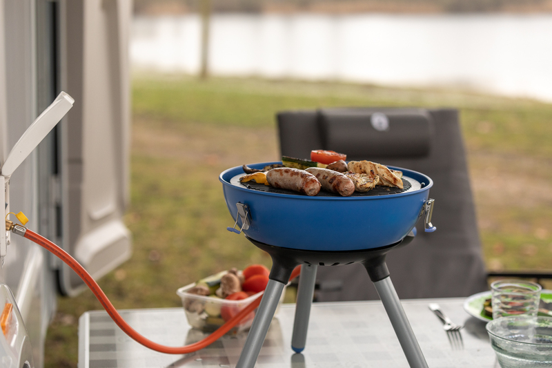 How does the Campingaz Party Grill 400 CV enhance user experiences
