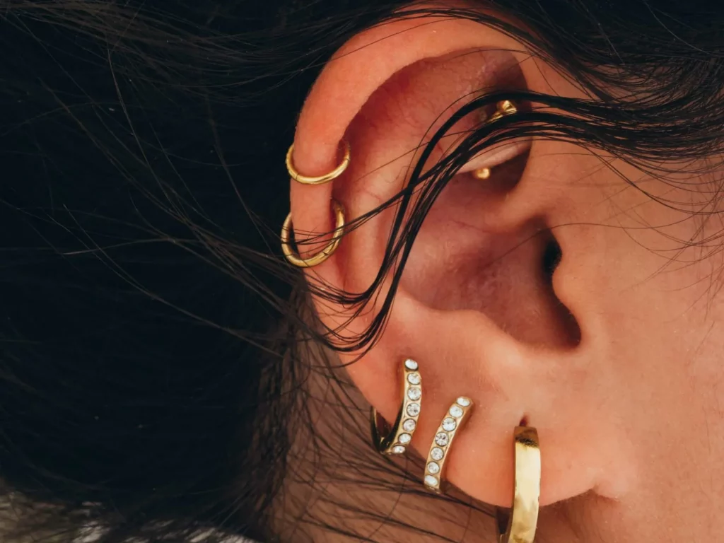 Explore the cultural and historical roots of ear piercings